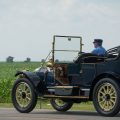 Model T on the Lincoln Highway, cornfield in background