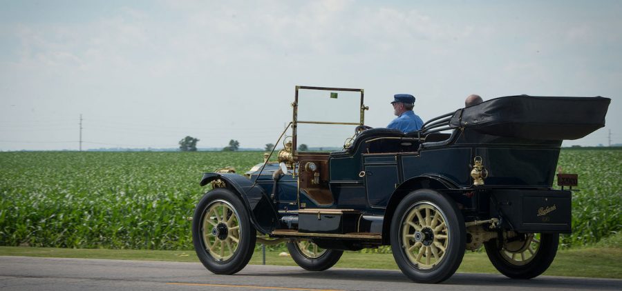Model T on the Lincoln Highway, cornfield in background