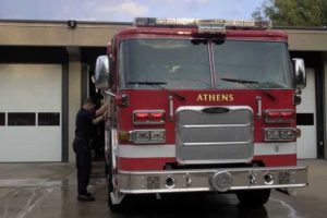 Athens City firefighter washes truck