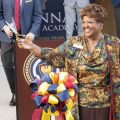 Ohio Board of Education President Charlotte McGuire cut the ribbon during the opening ceremony for Cincinnati Classical Academy, one of the latest charter schools in Ohio. She described the opening as a “momentous time.”