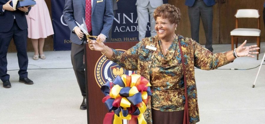 Ohio Board of Education President Charlotte McGuire cut the ribbon during the opening ceremony for Cincinnati Classical Academy, one of the latest charter schools in Ohio. She described the opening as a “momentous time.”