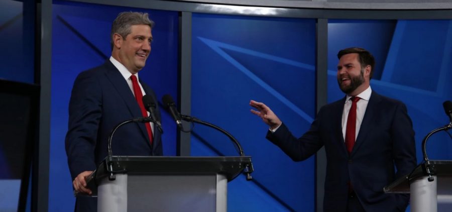 Tim Ryan and J.D. Vance smile on state of Monday's U.S. Senate Debate in Cleveland.