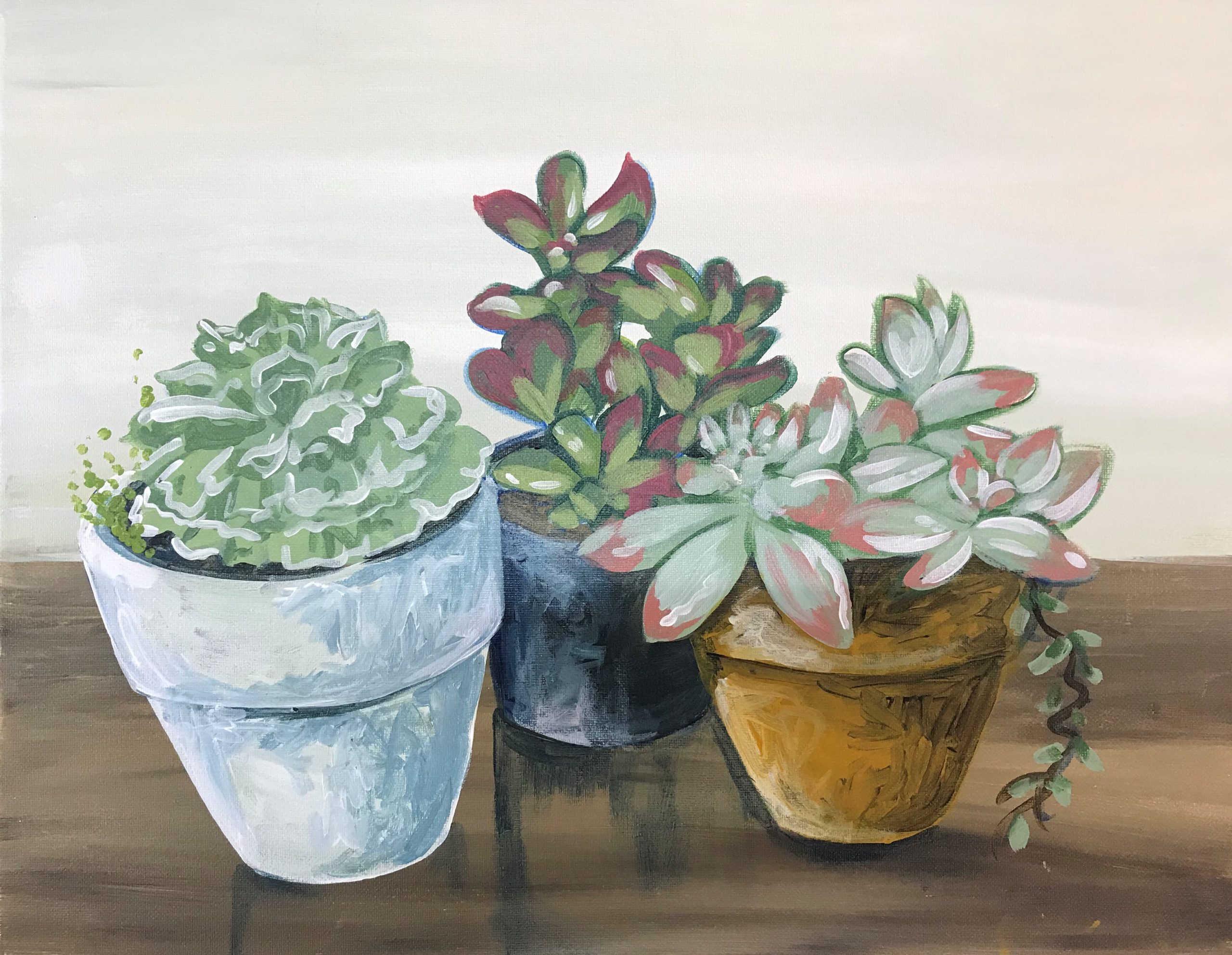 An image of painted succulents.