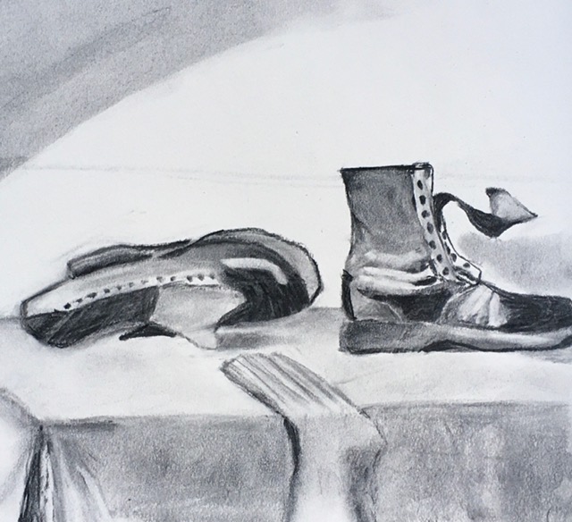 A drawing of two shoes drawn in pencil.