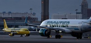 A Frontier Airlines plane prepares to take off from Harry Reid International Airport in Las Vegas, Nevada.