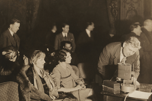 William Marston (far right) conducting his Reaction Test on movie audiences for Metro Gold Meyer, fall 1928.