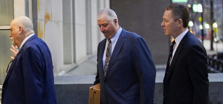 Former Ohio House Speaker Larry Householder, center, walks into Potter Stewart U.S. Courthouse with his attorneys, Mark Marein, left, and Steven Bradley, right, before jury selection in his federal trial