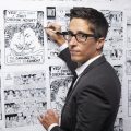 SIGNATURE PHOTO of Alison Bechdel with BG wall of her comics