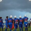 Football Team lined up straight looking at field