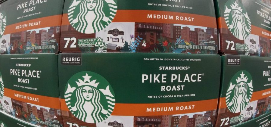Boxes of Starbucks medium roast coffee pods.