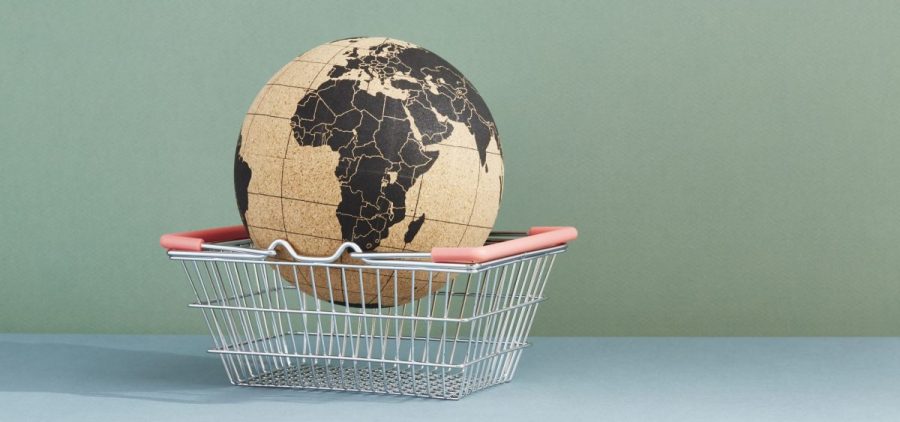 A globe sits in a shopping cart