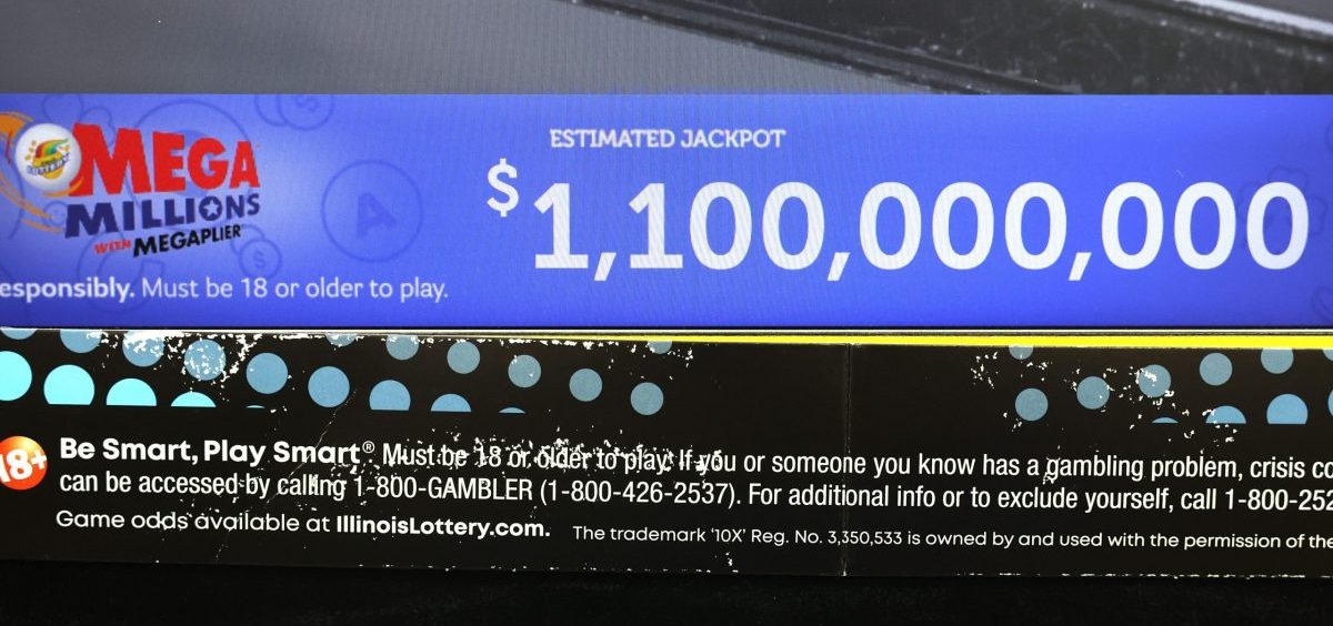 A ticket machine displays the projected jackpot of 1,100,000,000 for a Mega Millions drawing in Chicago, in early January.