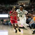 AJ Brown dribbles the ball and heads towards the basket against Northern Illinois