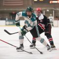 Christian Albertson takes a shot on the Minot State goal
