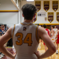 Meigs sophomore Dustin Vance looks at the court during a break in a game against the Jackson Ironmen