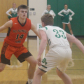 Nelsonville-York's Kegan Swope makes a move against the Fairland Dragons defender