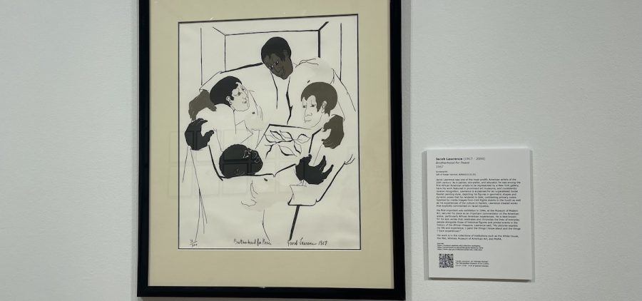 Artist Jacob Lawrence’s work, Brotherhood of Peace, is displayed amongst the many other pieces inside the "Centering Black Artists" exhibition at the Kennedy Museum of Art.