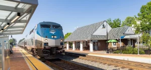 An Amtrak train pulls into a station in Ashland, Virginia.