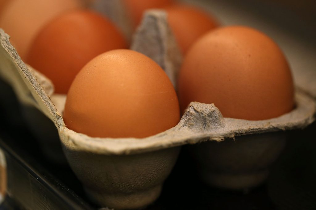 Brown eggs in an egg carton
