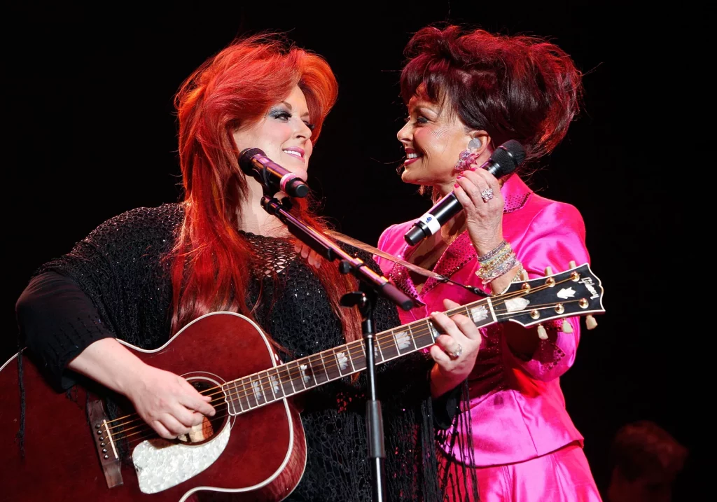Naomi Judd (right) and Wynonna Judd perform during the 2008 Stagecoach Country Music Festival in Indio, California. 