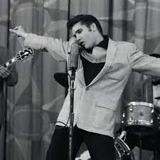 black & white of an early Elvis performing
