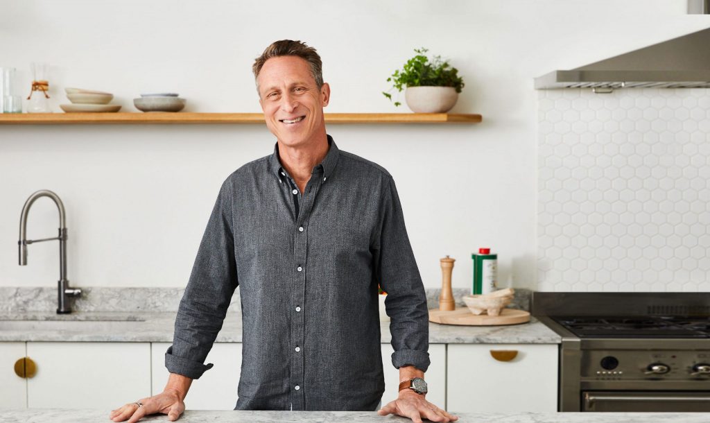 An image of Dr. Mark Hyman in a bright kitchen.