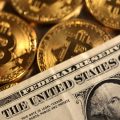 Illustration shows representations of cryptocurrency Bitcoin and U.S. dollar