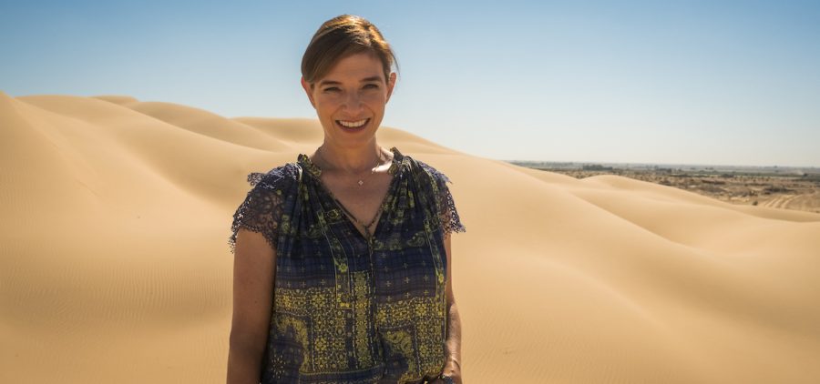 ati Jinich poses on the dunes of Algodones, Mexico