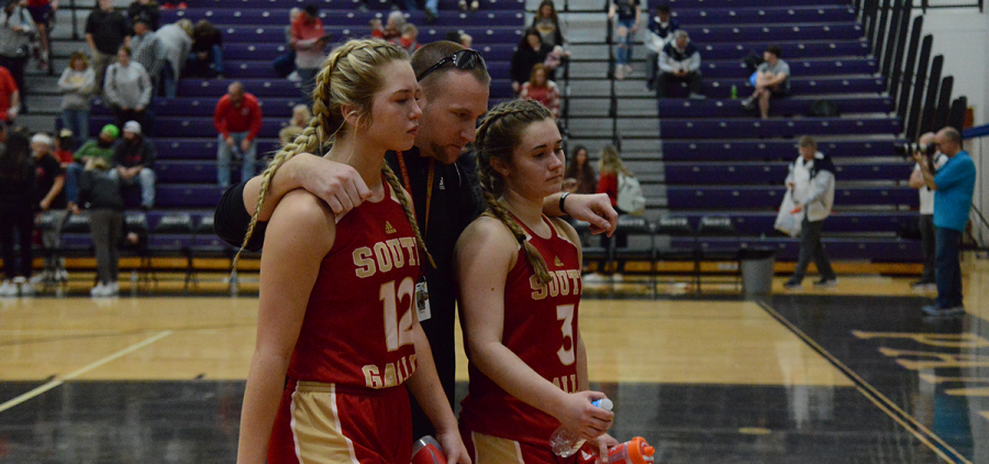 The South Sallia Lady Rebels walk off the court after a loss to Hiland