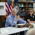 President Joe Biden participates in a briefing at Marie Roberts Elementary School about the ongoing response efforts to devastating flooding, Monday, Aug. 8, 2022, in Lost Creek, Ky. From left are Kentucky Gov. Andy Beshear, Biden, FEMA Administrator Deanne Criswell and Kentucky Lt. Gov. Jacqueline Coleman.