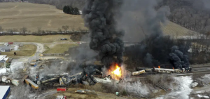 Smoke rises from burning train cars near East Palestine, Ohio.
