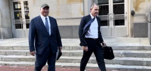 Republican former Ohio House speaker Larry Householder leaves the federal courthouse in Cincinnati with his lawyer Steven Bradley