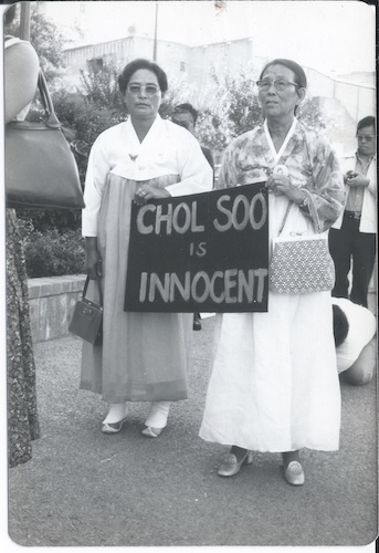 Korean immigrants demonstrate outside a Stockton, California, courthouse.