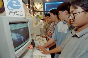 A visitor to a computer exhibition uses an internet software interface to view a World Wide Web site on Sept. 10, 1996, in Beijing.