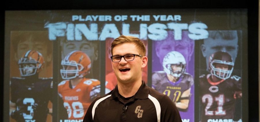 Jacob Motta standing on Gridiron Glory set