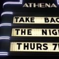 The Athena Cinema marquee advertises Take Back the Night.