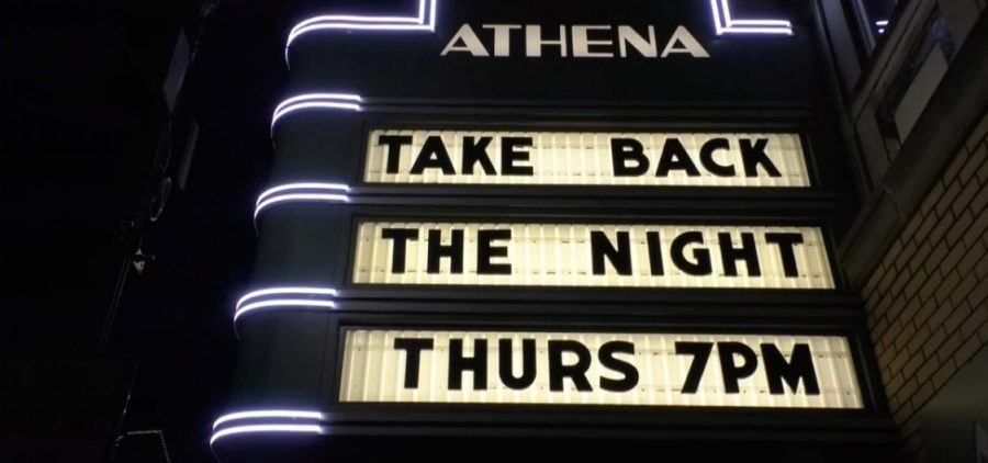 The Athena Cinema marquee advertises Take Back the Night.