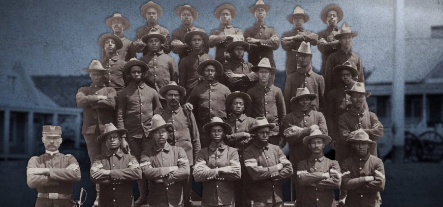 Group portrait of African American soldiers in Co. E, 9th United States Volunteer Infantry who fought in the Spanish-American War