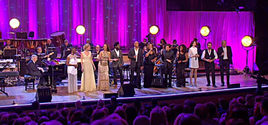 Burt Bacharach at the piano (left) with the entire cast.