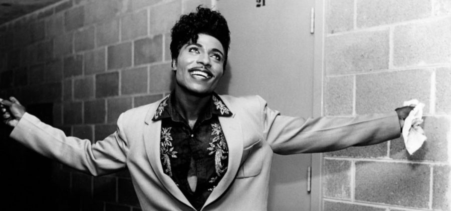LITTLE RICHARD - US rock musician about 1958. Smiling, arms in the air in suit about 1958