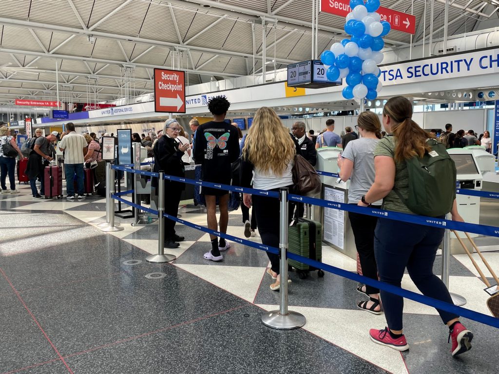 Travelers line up to get into the security checkpoint at Chicago's O'Hare airport last summer.