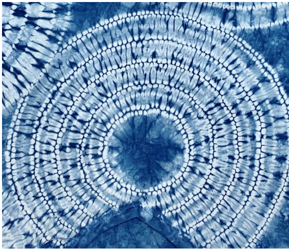 An example of shibori - which is mostly indigo blue with white designs.