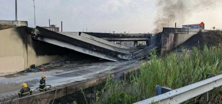 Firefighters work near a section of I-95 in Philadelphia that collapsed Sunday following a vehicle fire.