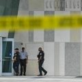 People walk in front of the Wilkie D. Ferguson Jr. United States Federal Courthouse in Miami