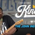 Promotional imge showing Christione "Kingfish" Ingram on guitair. Text reads "Christione 'Kingfish' Ingram with the John Inghram Band."