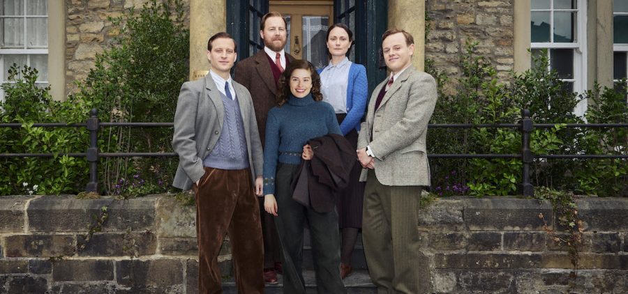 Cast of All Creatures Great and Small on house steps including James Herriot (Nicholas Ralph), Helen Alderson (Rachel Shenton), Tristan Farnon (Callum Woodhouse), Siegfried Farnon (Samuel West), Mrs Hall (Anna Madeley)