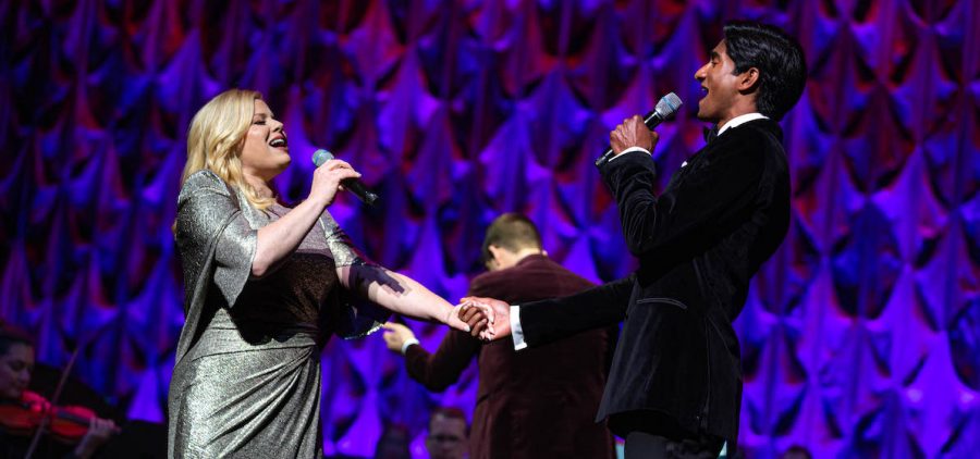 Megan Hilty and Michael Maliakel performing a duet.