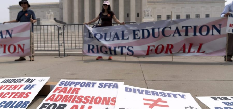 People protest outside of the Supreme Court in Washington. The Supreme Court on Thursday struck down affirmative action in college admissions, declaring race cannot be a factor and forcing institutions of higher education to look for new ways to achieve diverse student bodies.
