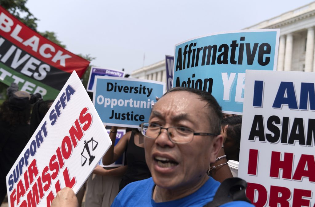 Demonstrators protest outside of the Supreme Court in Washington after the Supreme Court struck down affirmative action in college admissions, saying race cannot be a factor.