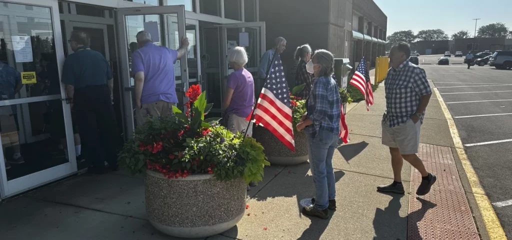 Voters line up in Columbus at Franklin County's early voting center on the first day of early in-person voting for the August special election.